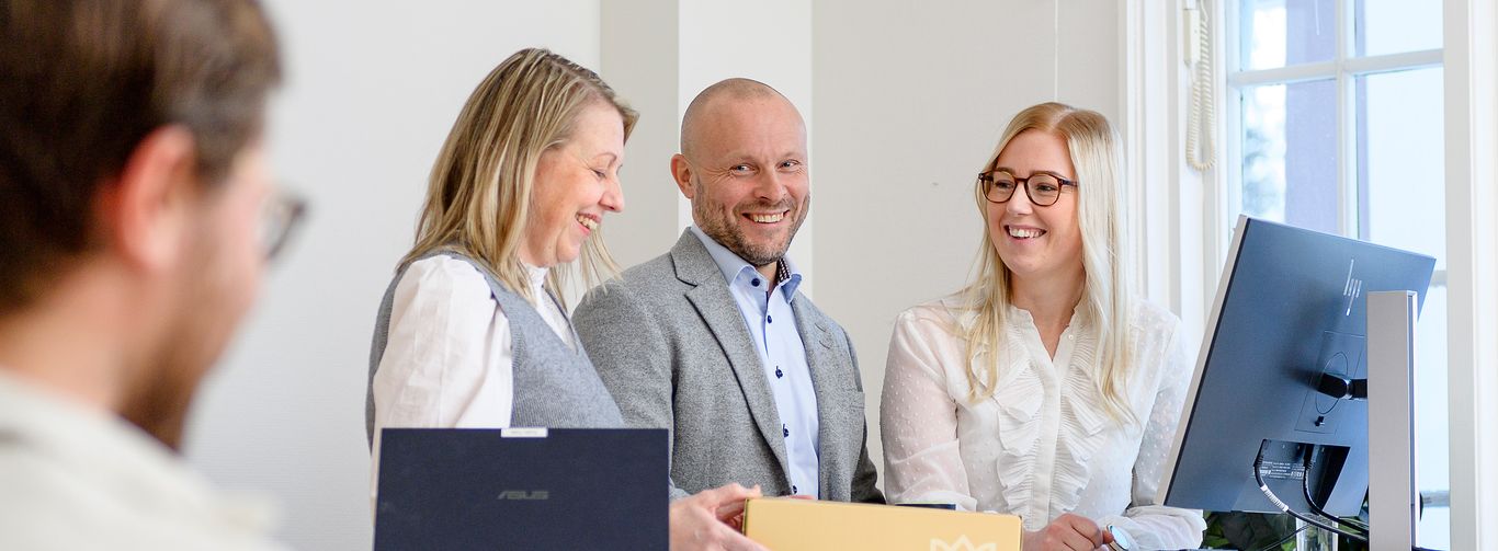 happy employees in office environment