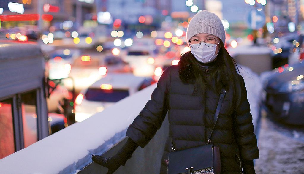 Asian woman in urban city